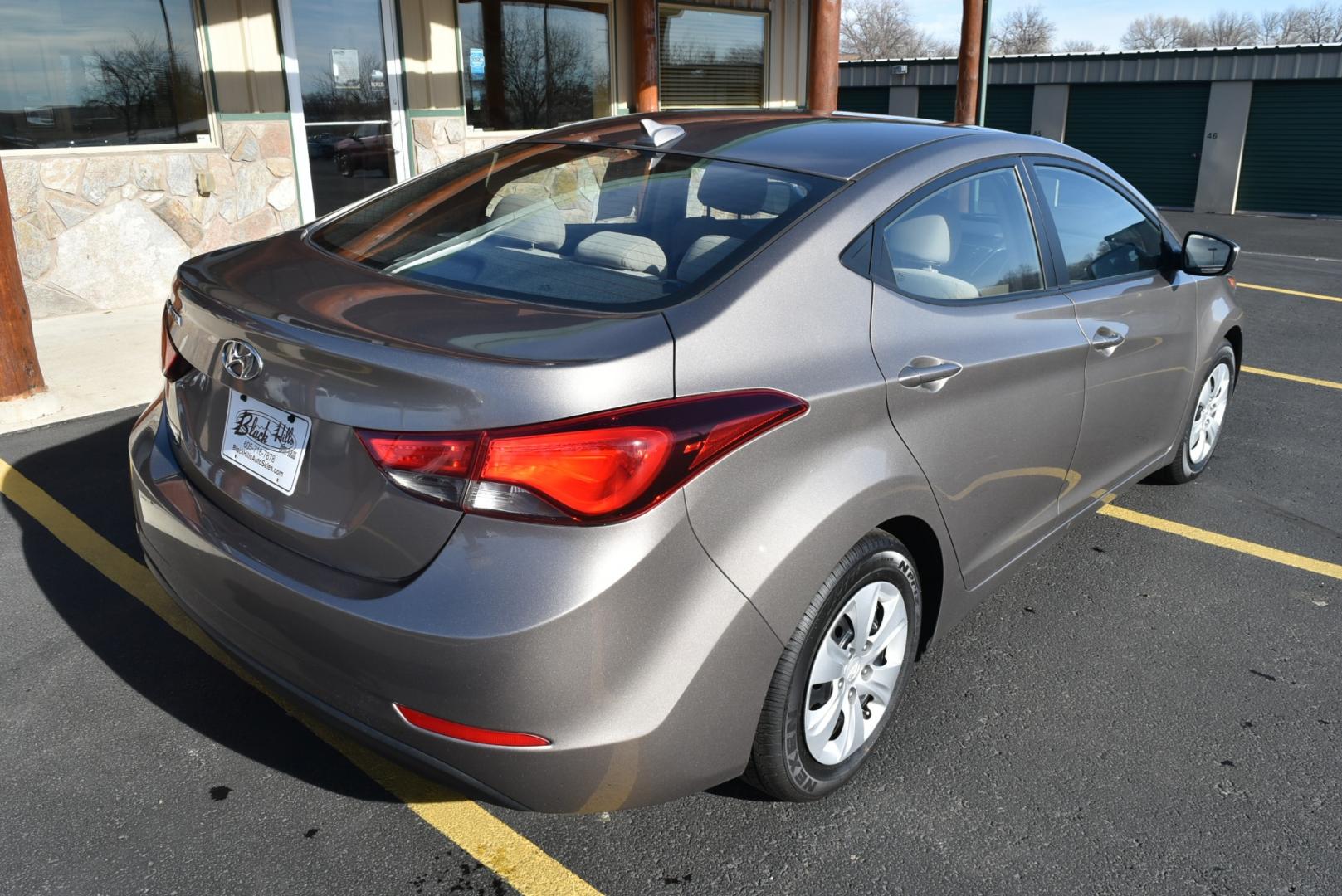 2016 Bronze Hyundai Elantra SE (5NPDH4AE3GH) with an 1.8L 4 Cyl engine, 6-Speed Automatic transmission, located at 1600 E Hwy 44, Rapid City, SD, 57703, (605) 716-7878, 44.070232, -103.171410 - Photo#7